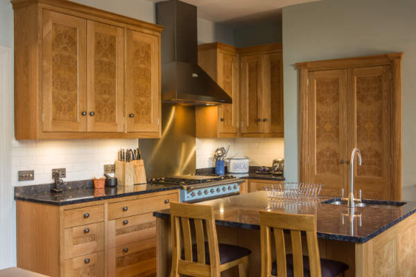 View of kitchen island with breakfast bar