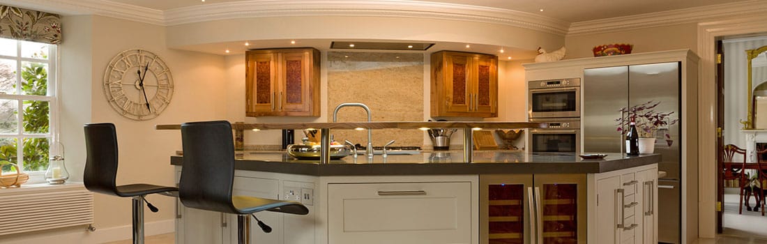 Kitchen with island, solid elm cabinets and Burr Elm veneered doors in country house - Chew Magna near Bristol